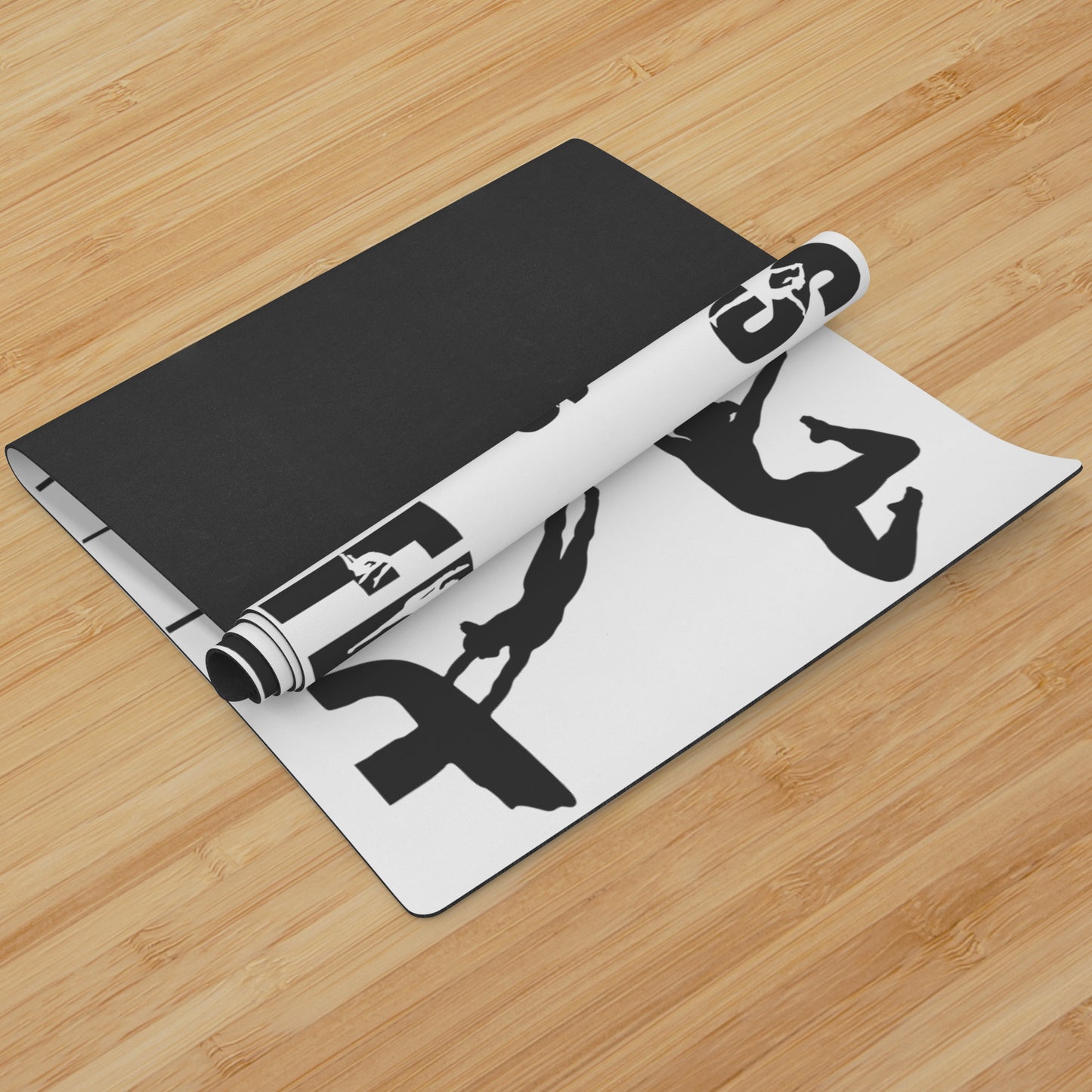 This Gymnastics is Life Yoga mat is white, and features black silhouettes of talented gymnasts across the front, along with the phrase "Gymnastics is Life" in a fun black gymnastics font