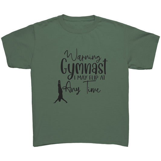 Military Green Colored Warning: Gymnast I May Flip At Any Time Boys' T-Shirt. This t-shirt says Warning Gymnast I may Flip at Any Time in black font and features a male gymnast in a handstand. 