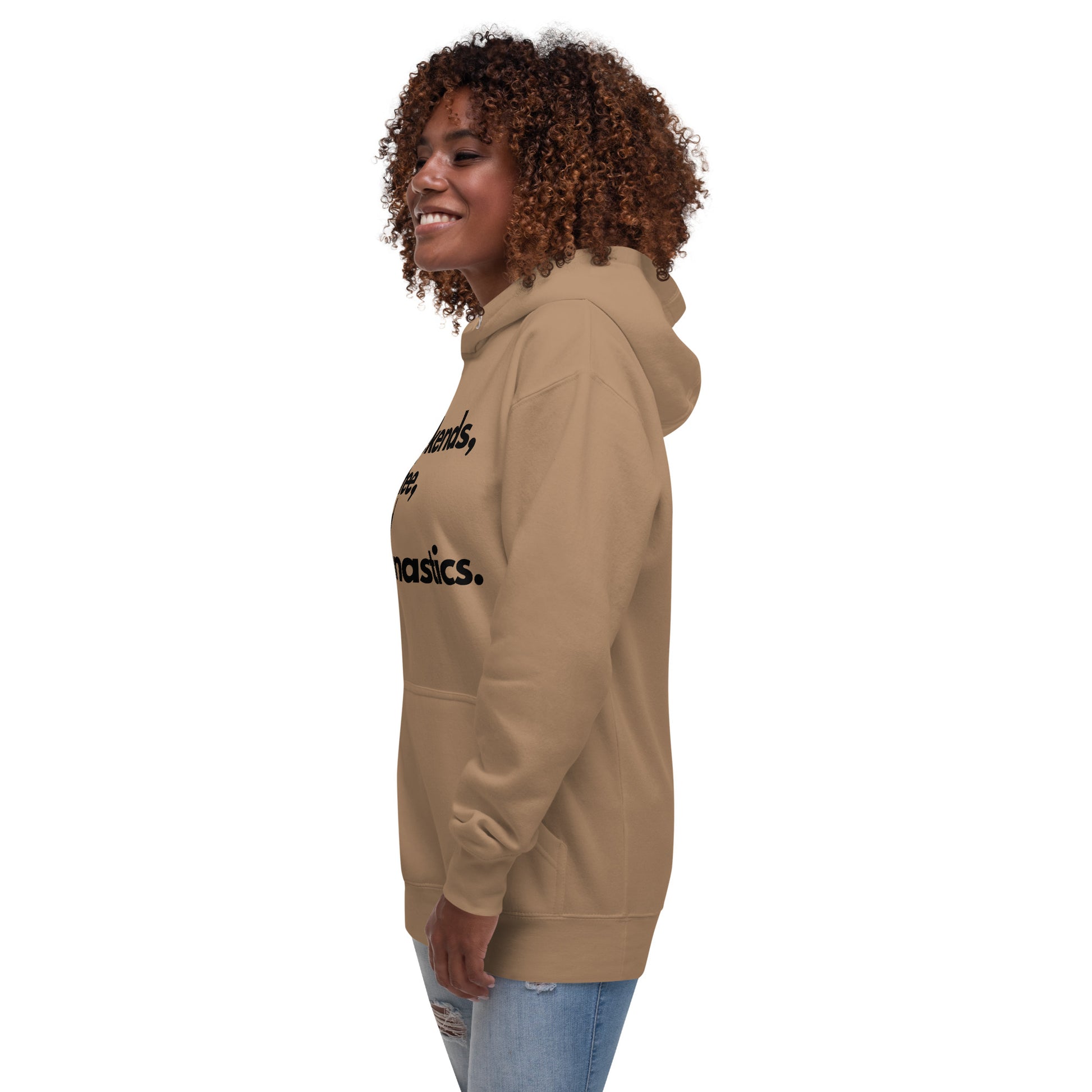 Latte tan pullover hoodie with hood, side view; small chest print partly visible.