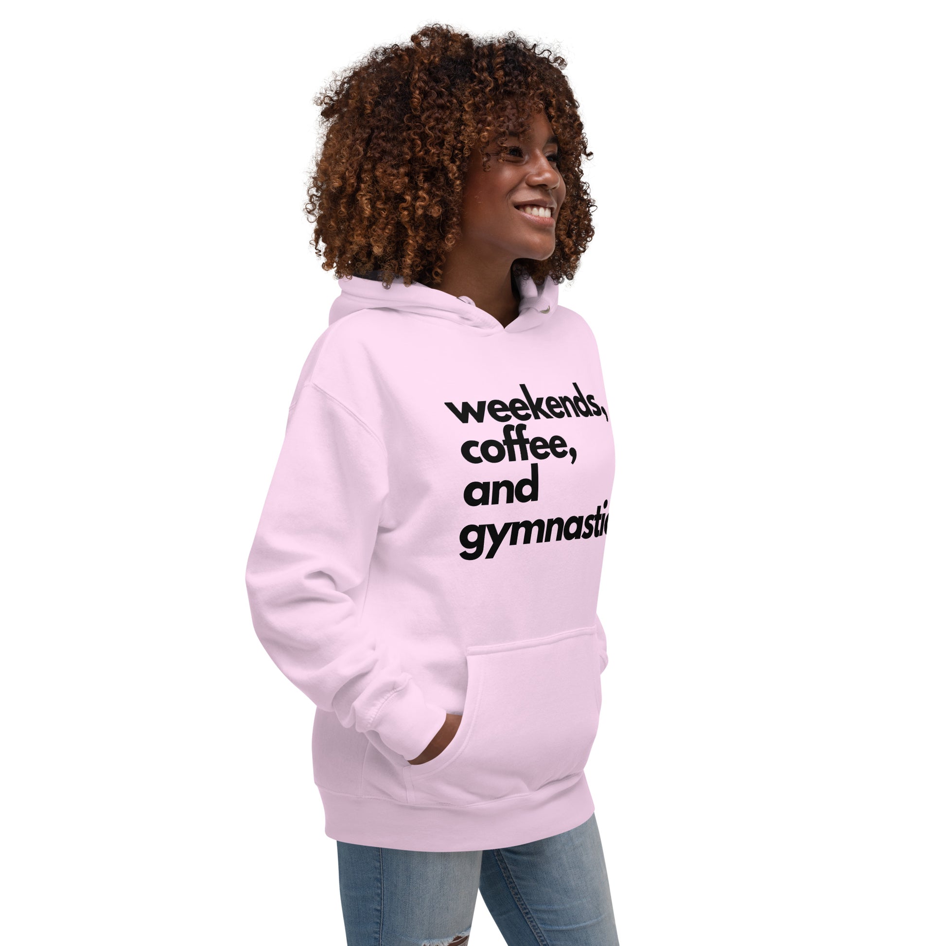Light pink hoodie with 'weekends, coffee, and gymnastics' text on front