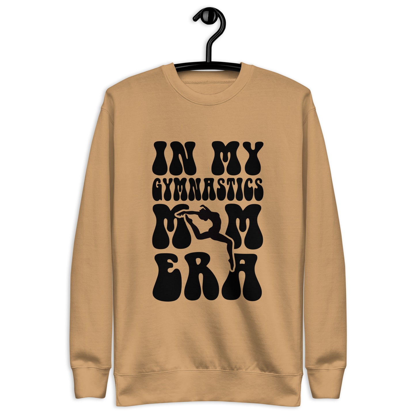 Tan hoodie with “In my gymnastics” graphic text and stylized hands