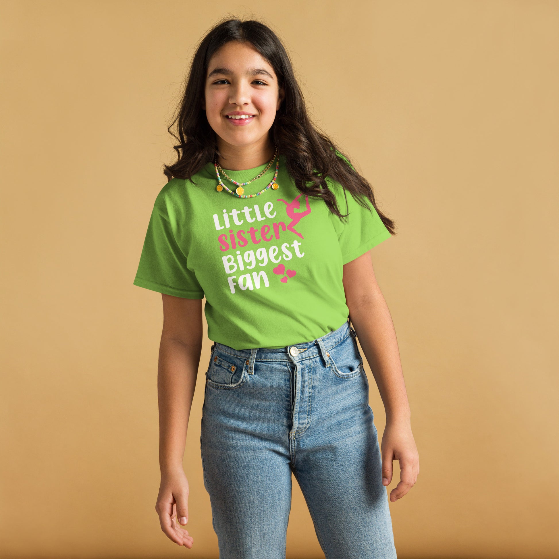 Lime green kids gymnastics T-shirt with “Little sister Biggest fan” graphic and pink accents