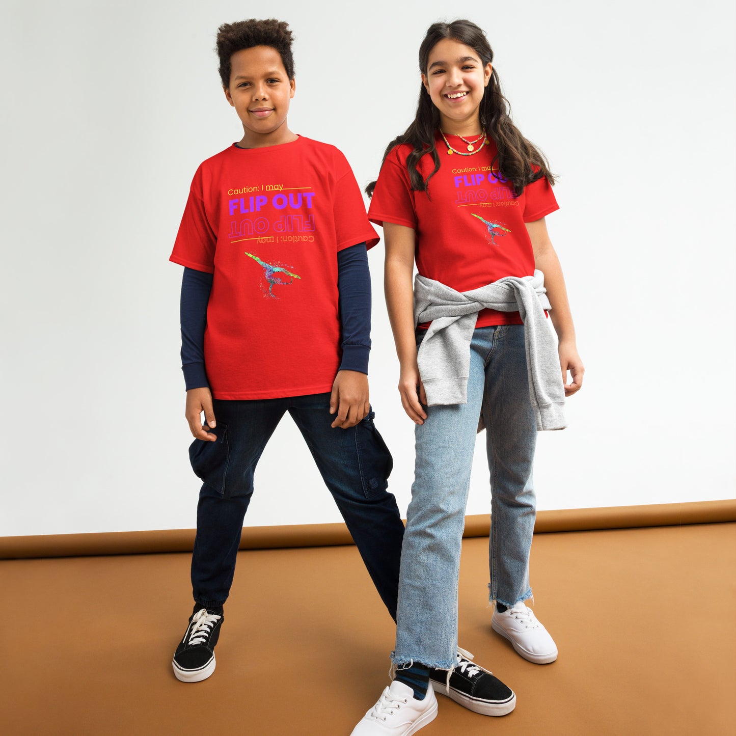 Kids gymnastics T-shirt, red with “Flip Out” graphic and small gymnast logo at chest