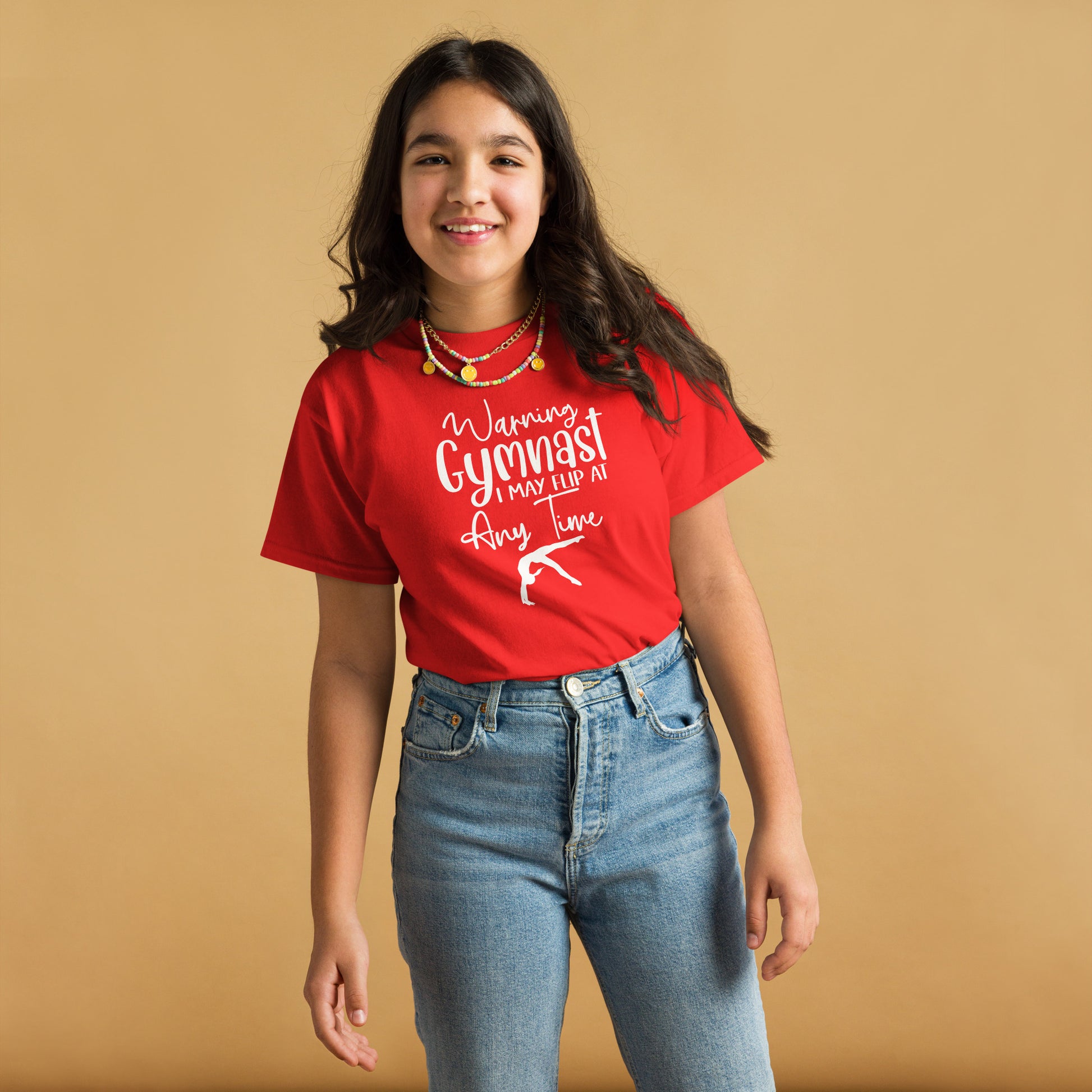 Red kids gymnast T-shirt with white warning text and gymnast pose graphic on front