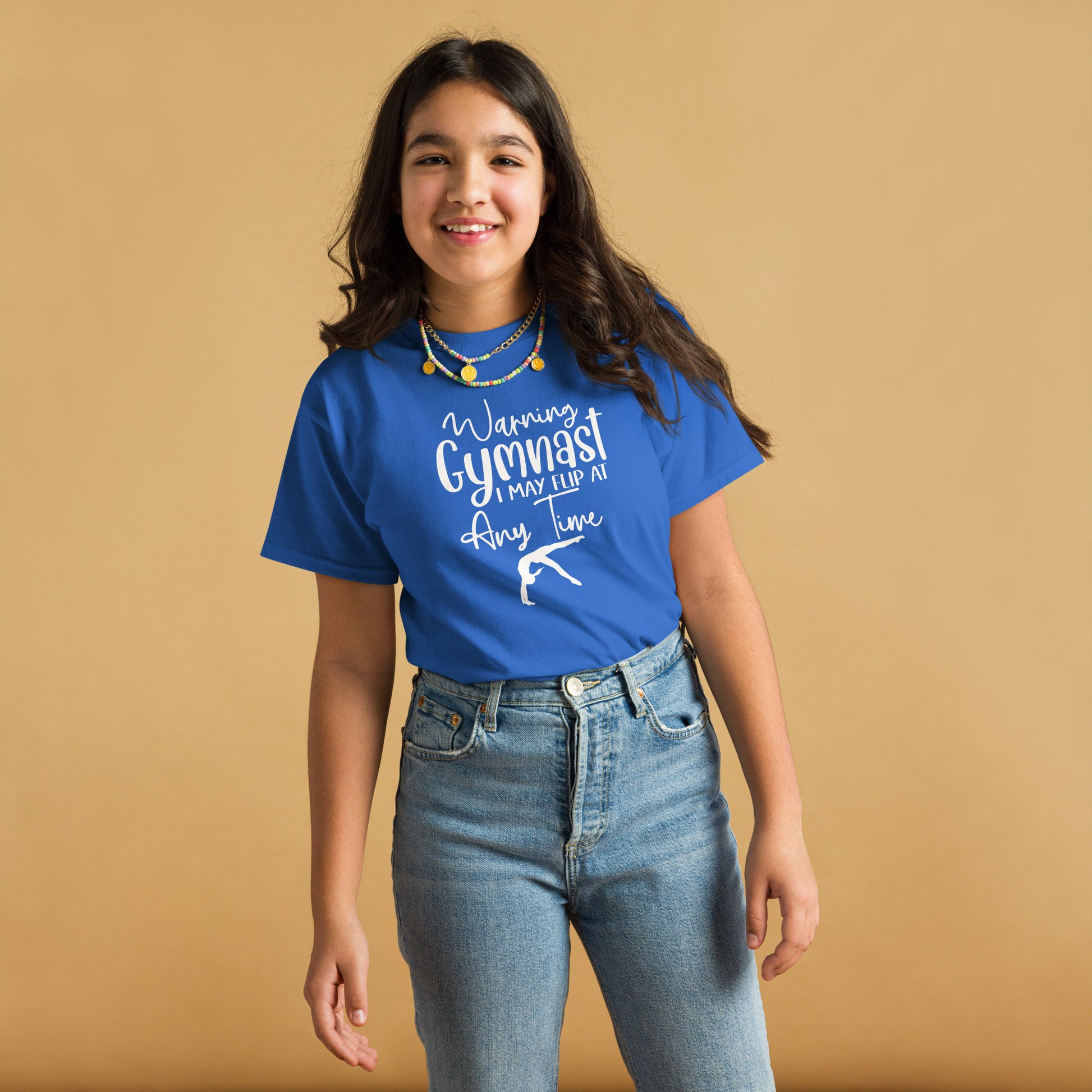Blue kids gymnast T-shirt with white warning text and gymnast pose graphic on front