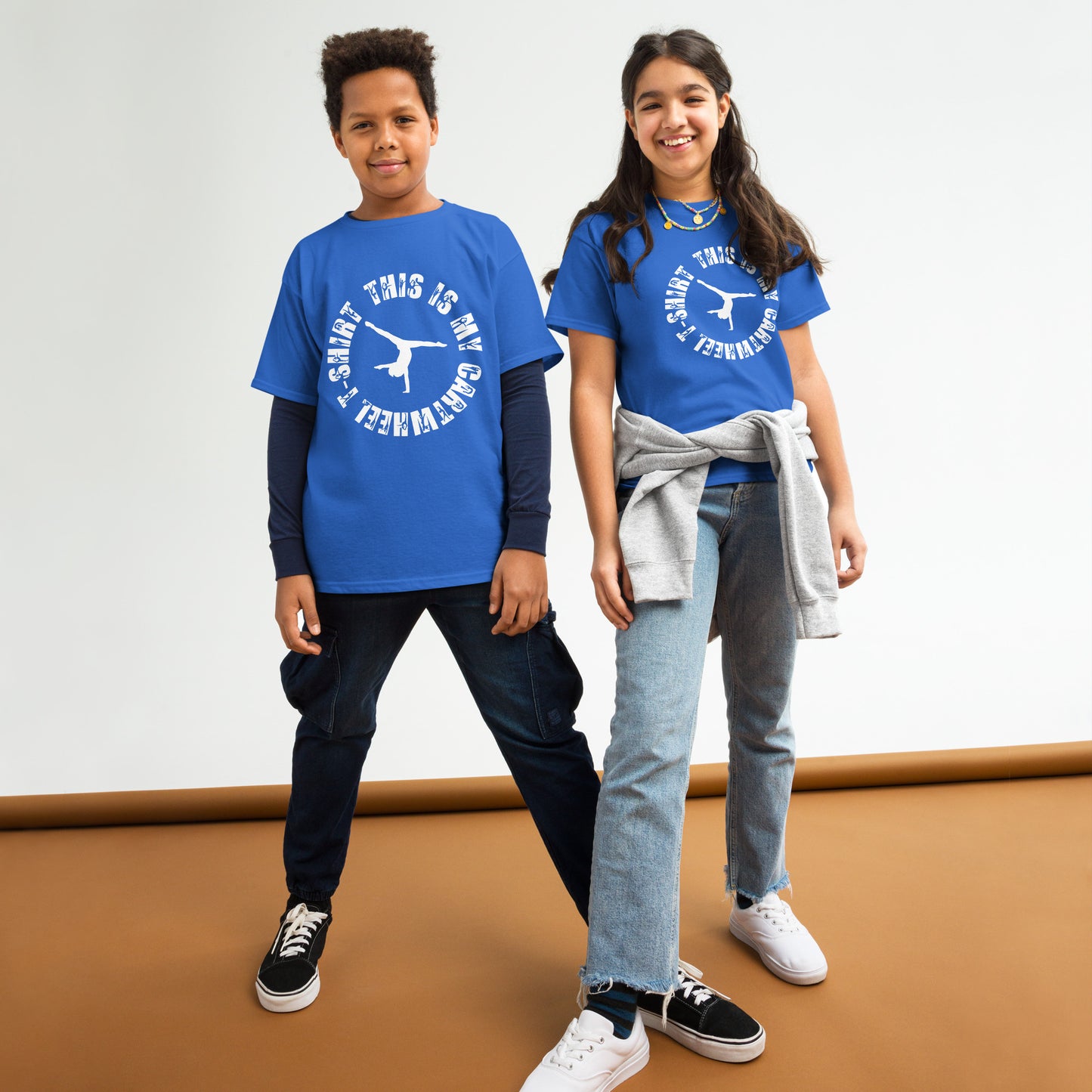 Kids blue gymnast T-shirt with white circular dancer graphic and crew neck