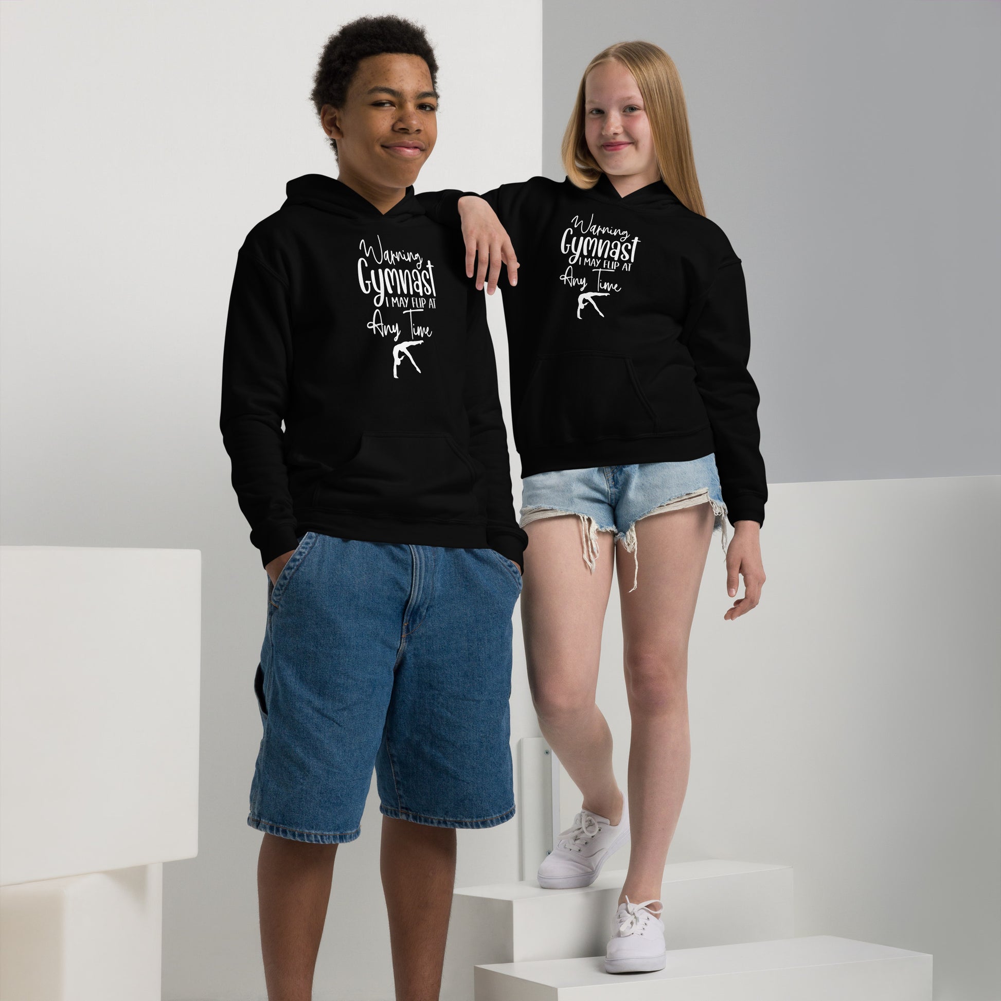 Kids black hoodie with hood and kangaroo pocket, gymnast graphic on chest