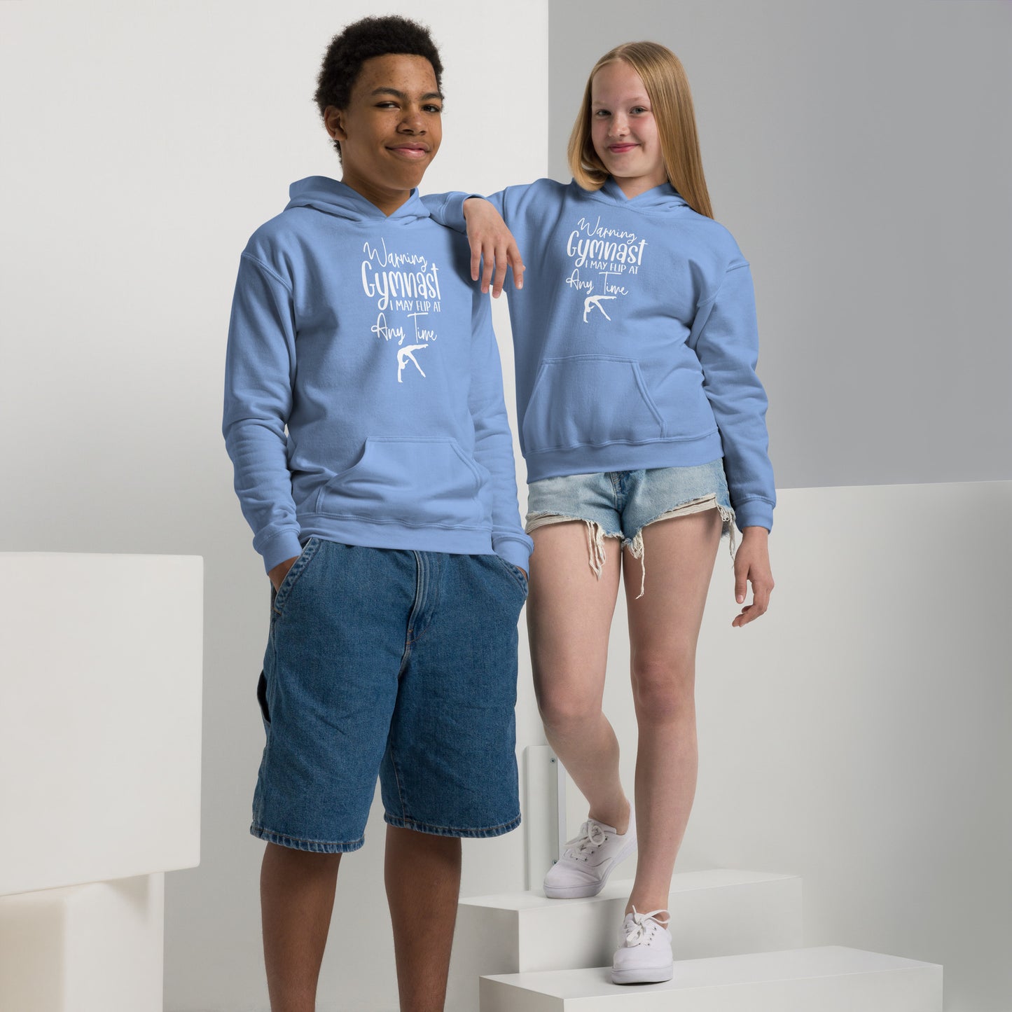 Two kids in blue hoodies with front print and kangaroo pocket, plus drawstring hood