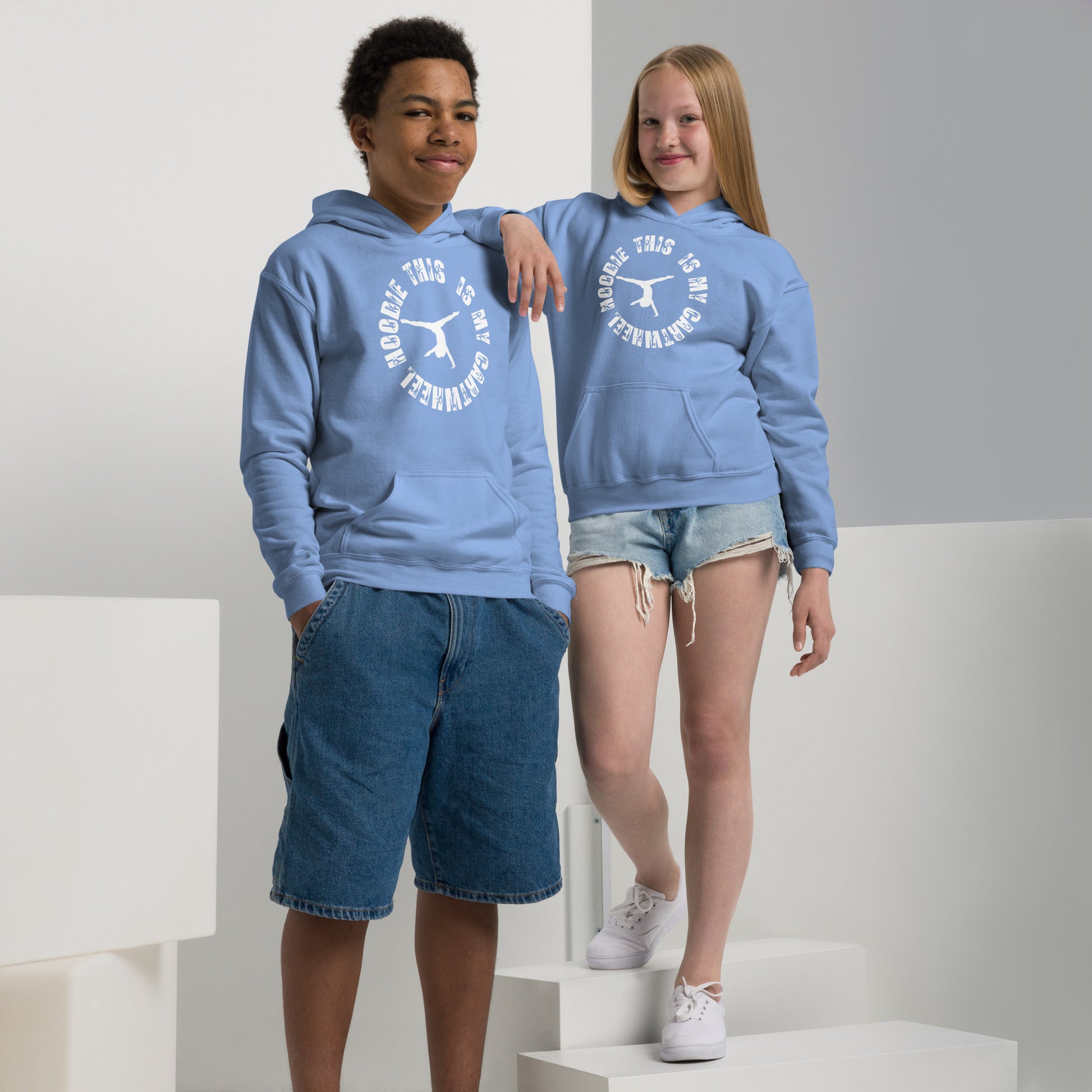 Kids gym hoodie in light blue with hood and front kangaroo pocket, white logo graphic