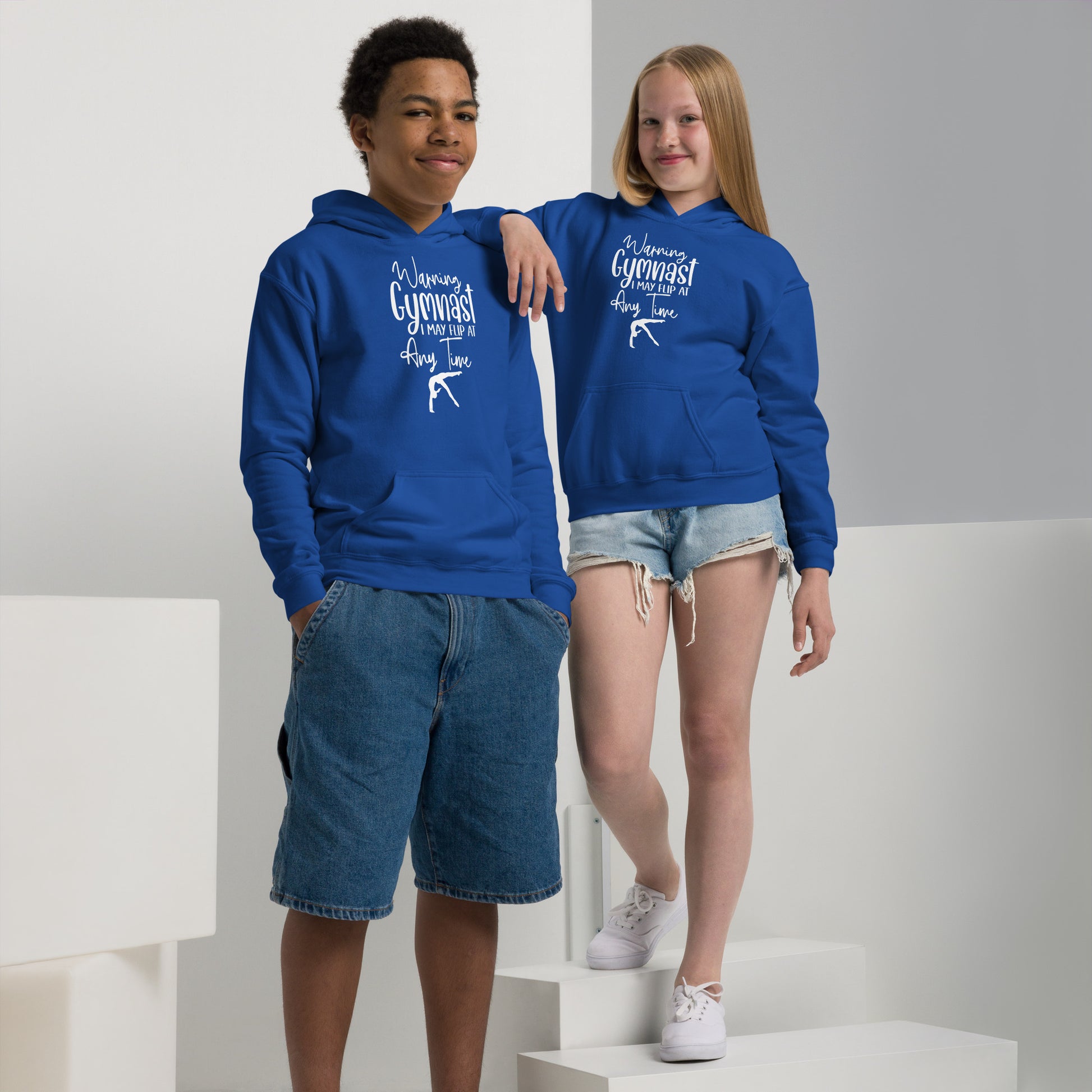 Kids blue hoodies worn by two children, featuring front graphic and drawstring hood